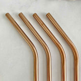 rose gold straws bent closeup