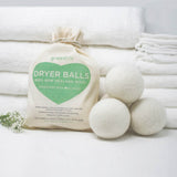 white wool dryer balls with bag